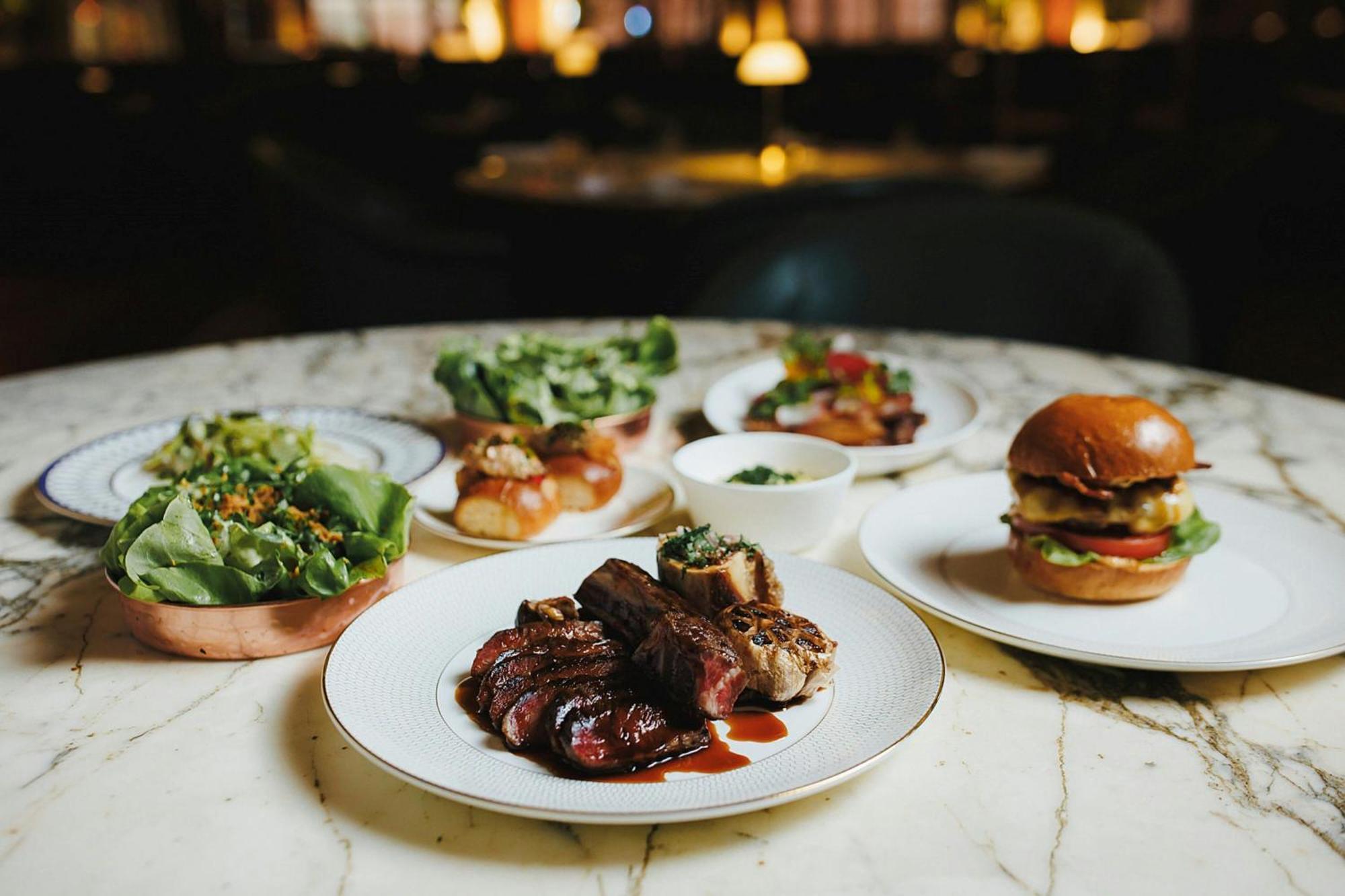 Stock Exchange Hotel, Manchester, Autograph Collection מראה חיצוני תמונה A selection of dishes at the restaurant